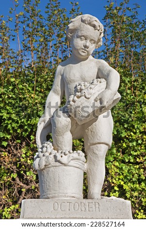 Vienna - The symbolic sculpture of october month in the gardens of Belvedere palace.