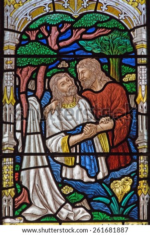 JERUSALEM, ISRAEL - MARCH 5, 2015: The baptism of Christ scene on the windowpane in st. George anglicans church from end of 19. cent.