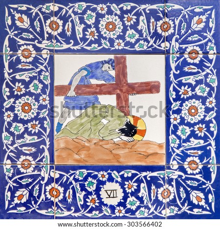 JERUSALEM, ISRAEL - MARCH 5, 2015: The ceramic tiled station of Cross way in st. George anglicans church from 20. cent. by unknown artist.  Jesus fall under cross.