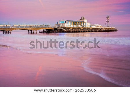 Bournemouth pier at Sunset from the beach Dorset England UK Europe