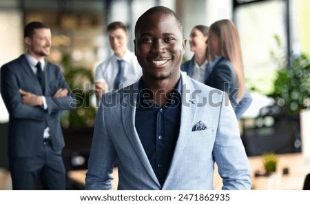 Image, Stock Photo Handsome Black Man with Earphones Posing on Big City Street