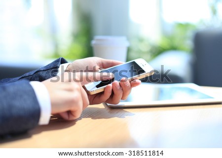Modern workplace with digital tablet computer and mobile phone