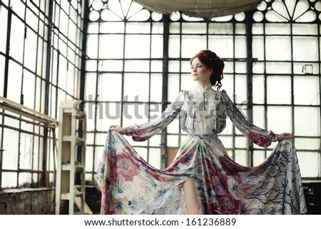 Elegant woman in romantic dress. Fashion shot.