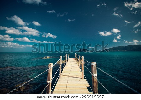 travel and vacation concept - wooden bridge, sea, summer, vacation, happy time