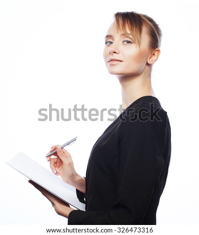 Business, people and office concept: young business woman with blank paper, reading and writing