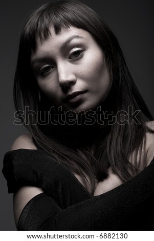 young black hair woman portrait on dark background