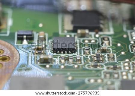 macro zoomed black processor on circuit board (computer hardware)