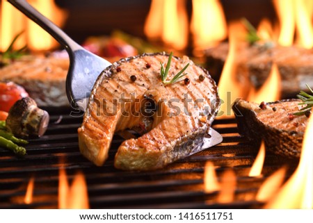 Similar – Image, Stock Photo Seafood  cooking . Raw Octopus with natural ingredients: spices, fresh herbs and knife. Cooking preparation on grey concrete background. Healthy and natural lifestyle. Top view