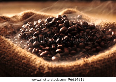 Coffee beans with smoke in a bag.