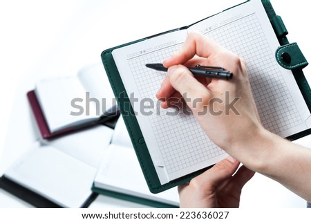 Hand write on notebook on white background