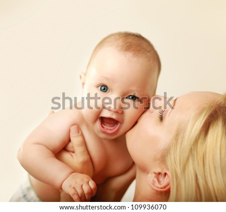 Cute newborn in mother\'s