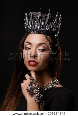 portrait of woman in black crown