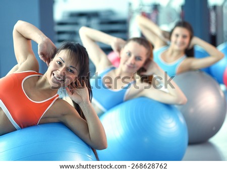 Group of people in a Pilates class at the gym