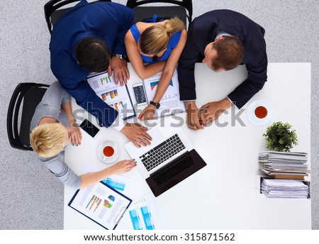 Top view of a team of office workers