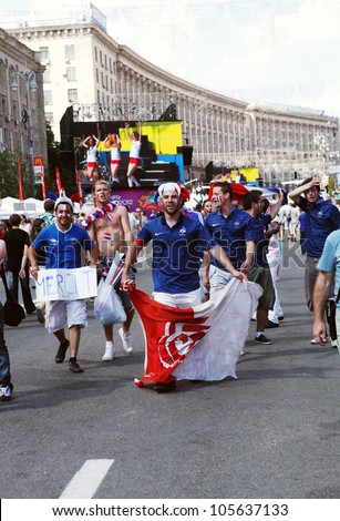 KYIV, UKRAINE - JUNE 19 2012: March of french football fans before start match Sweden - France, Group D.   Official fan zone  on Khreshatyk street.   EURO 2012 in Kyiv, 19 june 2012.