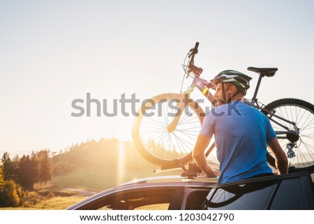 Similar – Foto Bild Junge Radfahrerin macht pause