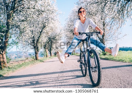 Similar – Image, Stock Photo Bike Girl Young woman