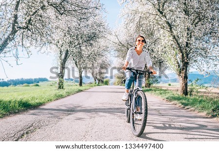 Similar – Image, Stock Photo Cycling in the park