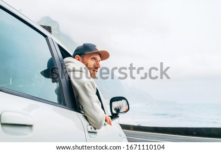 Similar – Image, Stock Photo A proud car owner in 1936 in Gdansk, with his fancy runabout.