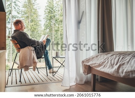 Similar – Image, Stock Photo balcony Reading Literature