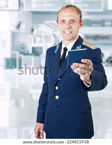Airport service man with  documents on the flight in hand