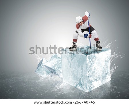 Ice hockey player on the ice cube during face-off