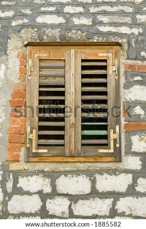 Old brown shutters on a wall in Sibenik Croatia.