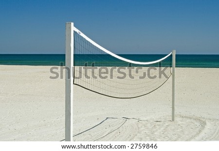 Volley ball net on a white sandy beach in Ponte Vedra Florida.
