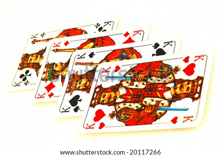Four poker play cards with all kings isolated on white background