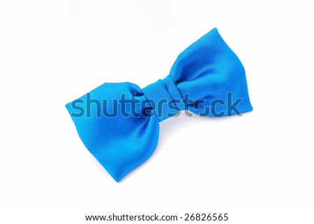 A little boy\'s blue bow tie isolated on white studio background