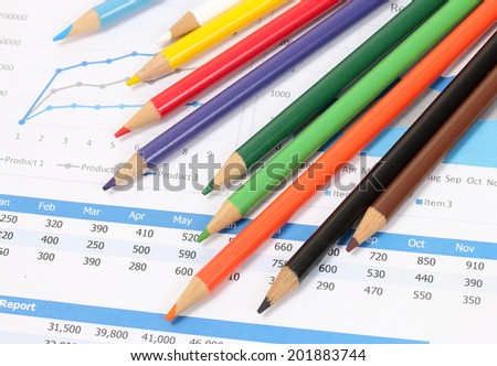 image of color pencils on business paper and desk