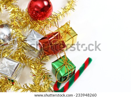closeup image of little gift box gold green red and silver color for christmas