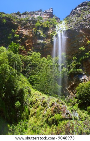 Triple-flow waterfall in awesome mountains. Shot in Wolwekloof mountain, near Franschhoek, Western Cape, South Africa.
