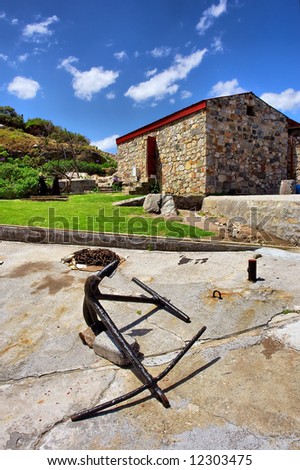 Old anchor in front of marine museum. Shot in Hermanus, Walker Bay, Western Cape, South Africa.