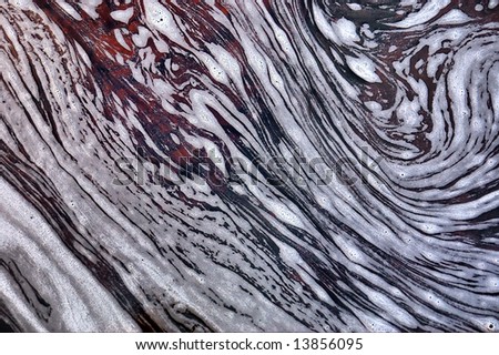 Pattern of foam on water. Shot in Jonkershoek Nature Reserve, Stellenbosch, Western Cape, South Africa.