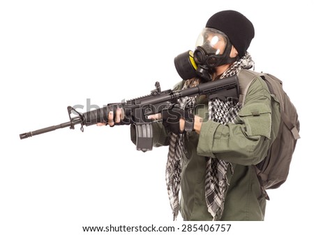Environmental disaster. Post apocalyptic female survivor with gas mask, rifle and go bag.