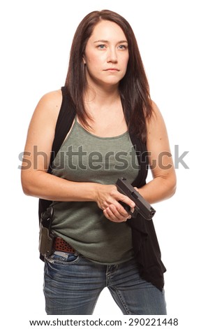 Woman Practicing Gun Safety | Attractive female shooter holding handgun against white background.