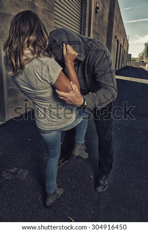 GIRL SELF DEFENSE | A young woman defends herself against a male attacker in an alley. Refuse to be a victim.