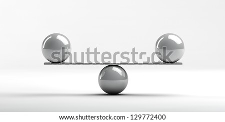 two ceramic spheres equally positioned on a balance board