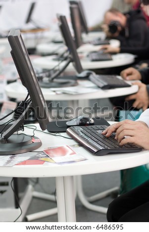 People working at the computer in the office