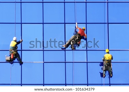 Similar – Image, Stock Photo Man washing window in yellow rubber gloves