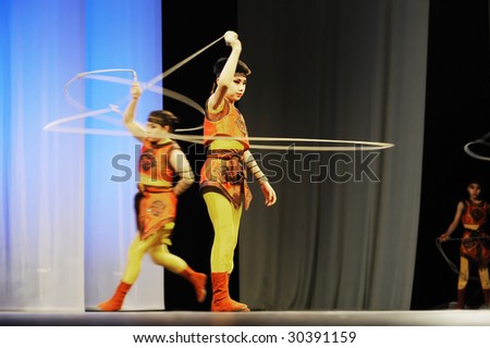 BELGRADE, SERBIA – MAY 16 : Chinese artists perform acrobatics at Great Chinese circus Confucius during their European Tour on May 16, 2009 in Belgrade.