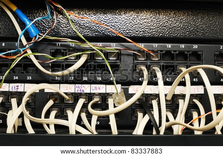 Cables connected to an optic and Fast/Giga ethernet ports