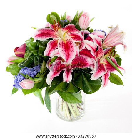 bouquet of lily flowers in glass vase