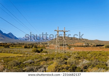 Similar – Image, Stock Photo overhead power cable or transmission line
