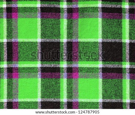Fabric Texture scottish patterned green plaid as a background
