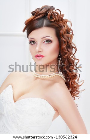 beautiful bride portrait with perfect bridal make up and hairstyle