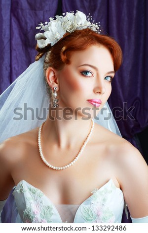 beautiful bride portraite with perfect bridal make up and hairstyle