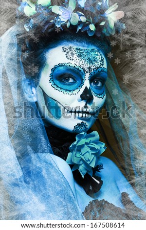 winter make up sugar skull beautiful model with ice. Santa Muerte concept.