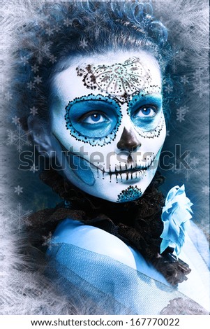 winter make up sugar skull beautiful model with ice. Santa Muerte concept.